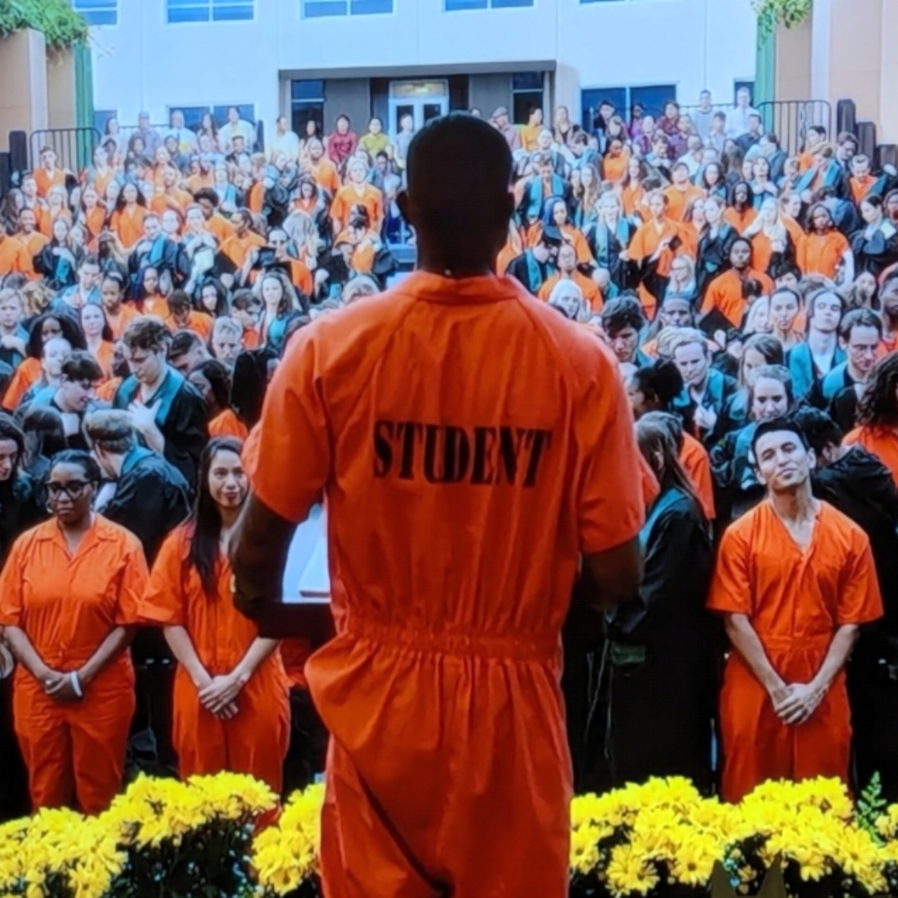 Orange Jumpsuit with 'STUDENT' Print From Grown-ish TV Series See measurements
